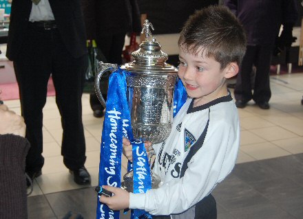 Young Pars fan with the Scottish Cup