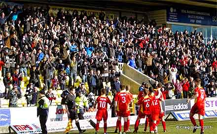 Pars players and fans celebrate equaliser