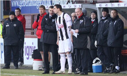 Steven McDougall waits to come on v Partick Thistle