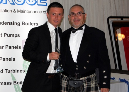 Joe Cardle receiving his Young Player of the Year Award from John Swift of the Centenary Club