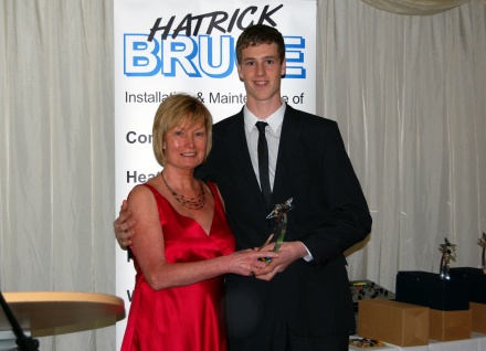 Jordan White receiving his U19 Player of the Year Award from Margaret Ross of the Pars Supporters Trust