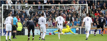 Chris Smith saves John Baird's penalty