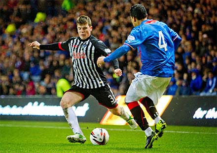 Alex Whittle takes on Arnold Peralta at Ibrox