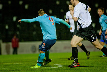 Ryan Wallace scores from the penalty spot