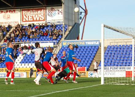 Andy Kirk sends the ball into the net