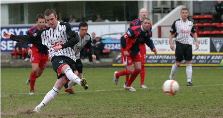 Andy Kirk scores from the penalty spot